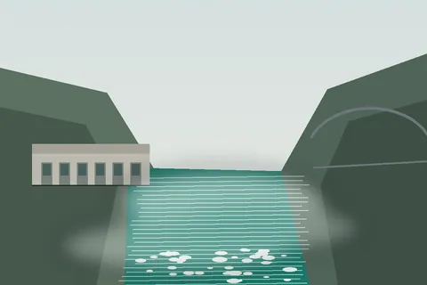 A concrete hydroelectric station on the emerald Niagara gorge with mist rising off the water